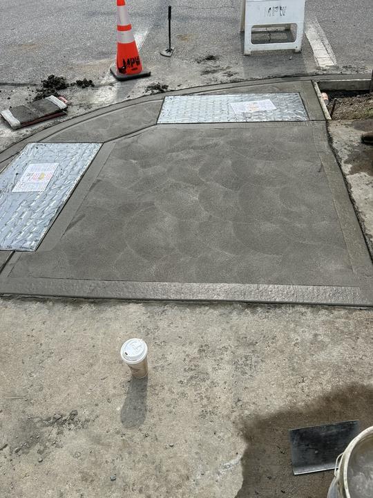 Commercial ADA ramp with detectable warning pads
