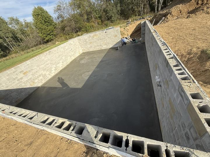 Excavated basement with block walls and poured floor