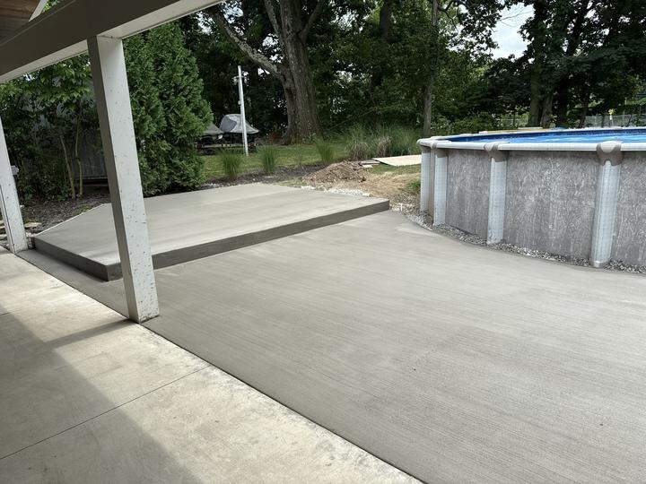 Patio slab beside an above-ground pool