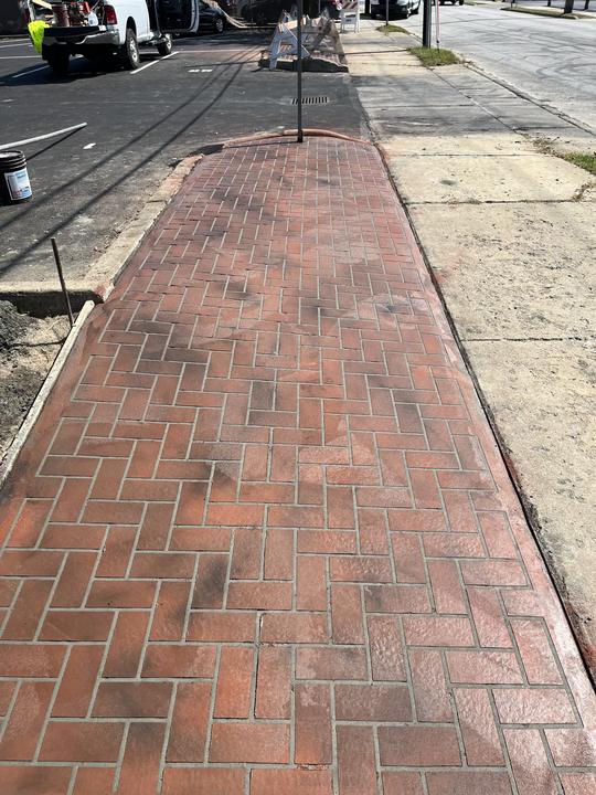 Stamped brick-pattern sidewalk